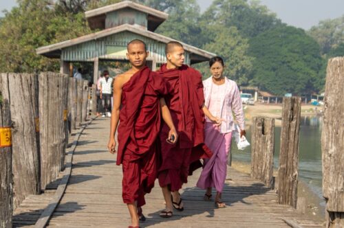 monks on bridge